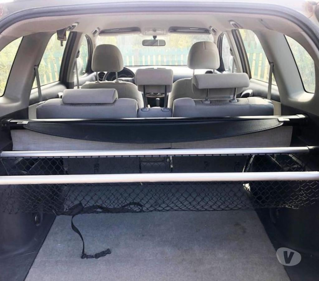Accesorios para Autos Santiago Santiago - Fotos de Cubre maleta Toyota Rav 4 y la malla protectora.