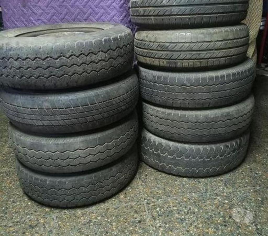 Accesorios para Autos Santiago Santiago - Fotos de 9 llantas con neumáticos de diferentes tipos y medidas.