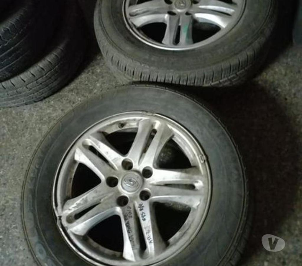 Accesorios para Autos Santiago Santiago - Fotos de 2 llantas originales y neumáticos impecables Hyundai sonata