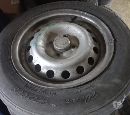Accesorios para Autos Santiago Santiago - Fotos de 5 neumáticos con llantas para furgón dfsk impecables.