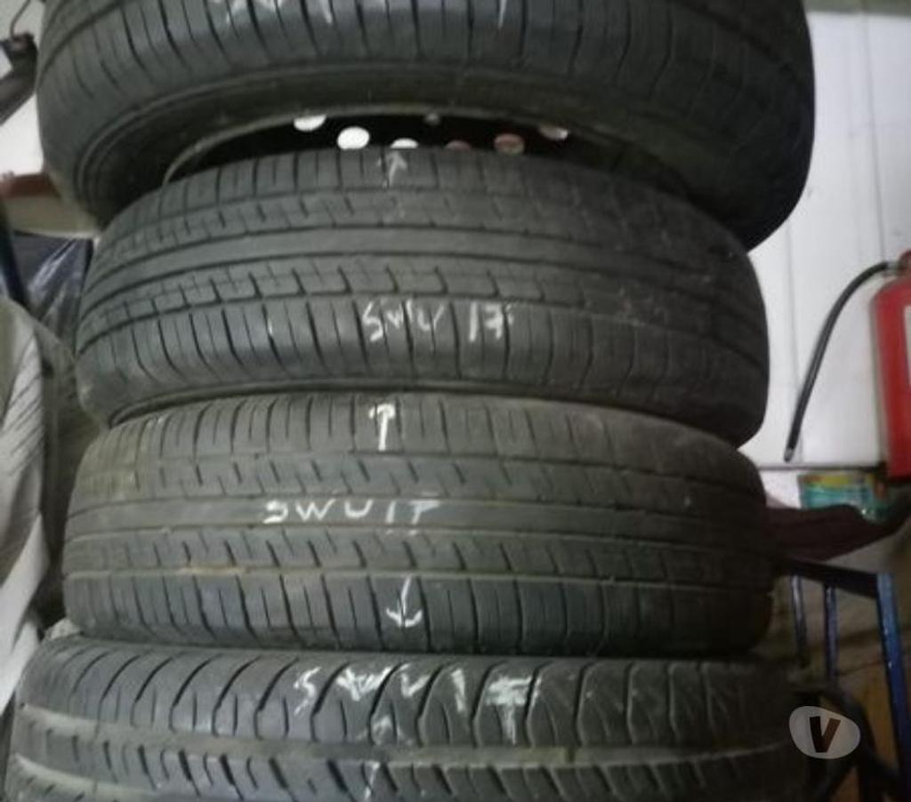 Accesorios para Autos Santiago Santiago - Fotos de 4 LLantas iguales con neumáticos Suzuki Swift año 2004