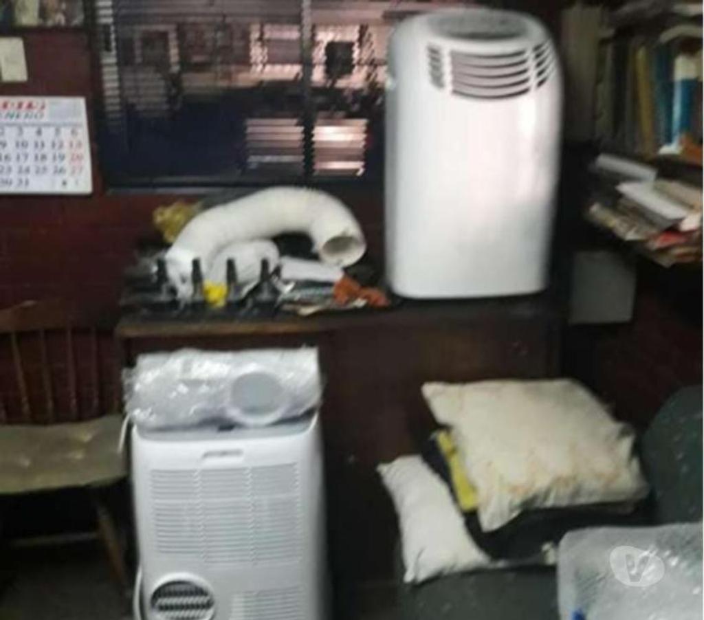 Electrodomésticos Santiago Santiago - Fotos de 2 equipos de aire acondicionado móviles de 9.000 Btu