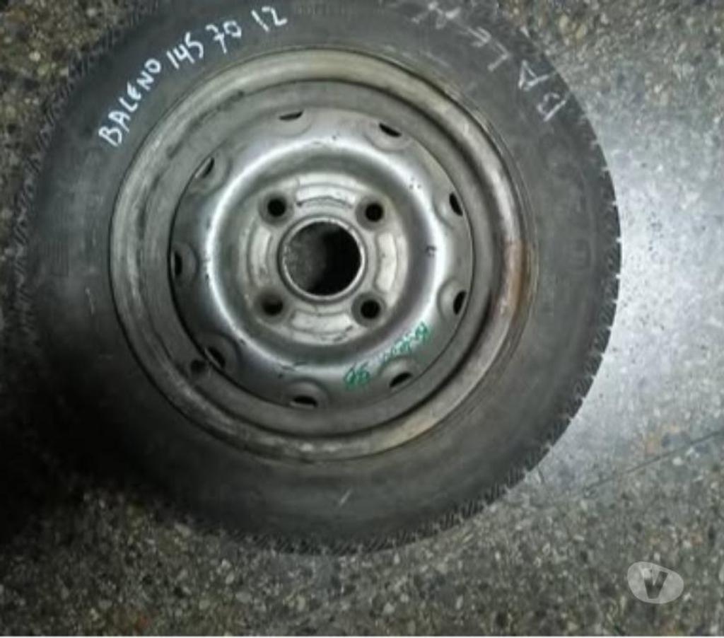 Accesorios para Autos Santiago Santiago - Fotos de Llantas con neumáticos para Suzuki baleno 1998 Aros 13 y 12