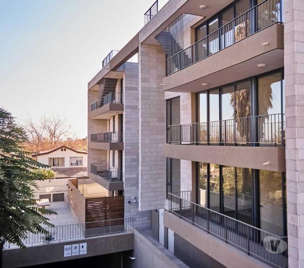 Bienes Raices Santiago La Reina - Fotos de Depto. nuevo con 180 m2 de patio exclusivo y 100 m2 útil