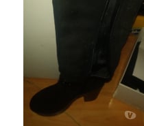 Botas largas con taco para mujer.