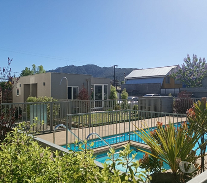 Inmobiliaria Chiguayante Concepción - Fotos de Control de acceso, piscina, juego niños y jardines