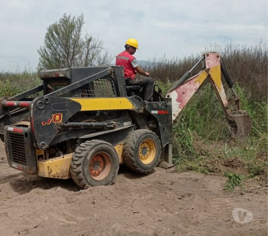 Fletes y Mudanzas - Transportes Santiago Las Condes - Fotos de arriendo minicargador martillo aguilon +56973677079 demolici