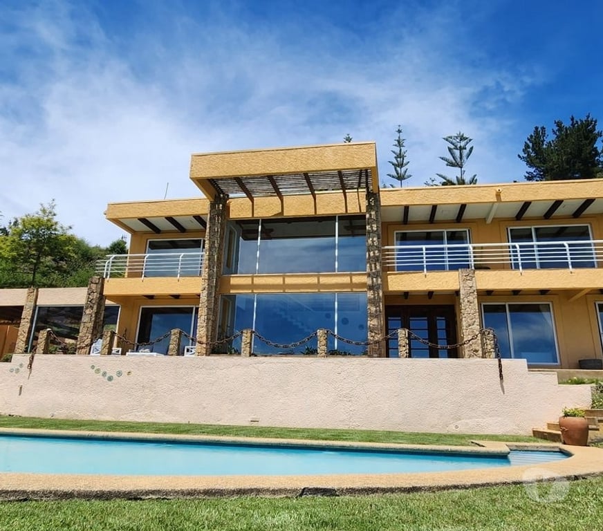 Bienes Raices Concepción Tomé - Fotos de Casa en Pingueral, condominio La Reserva, Tomé.